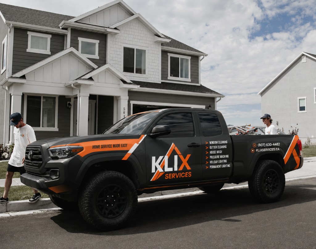 Klix Services truck parked in front of a Thunder Bay home