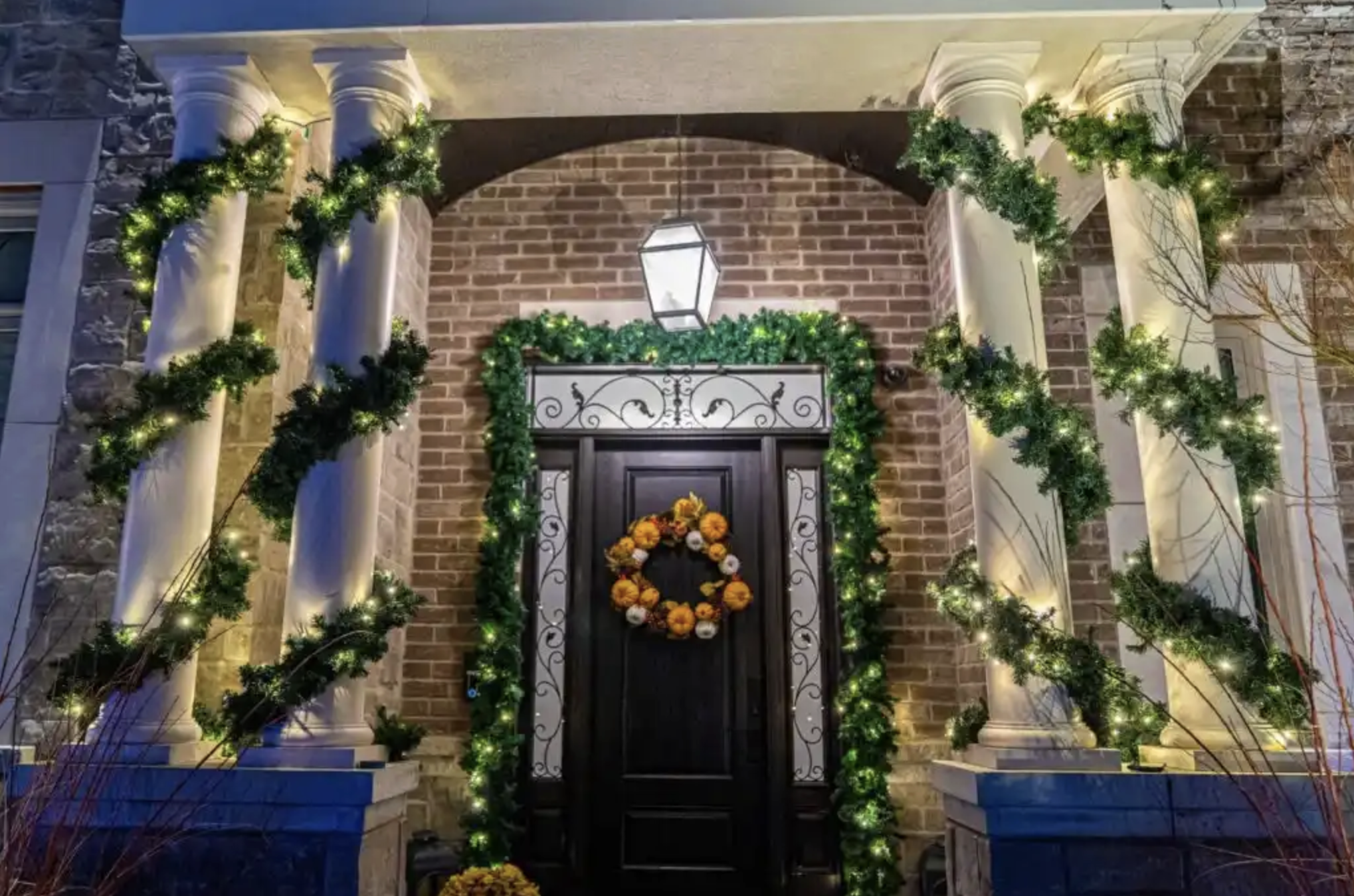 Holiday garland and lighting on a Thunder Bay home