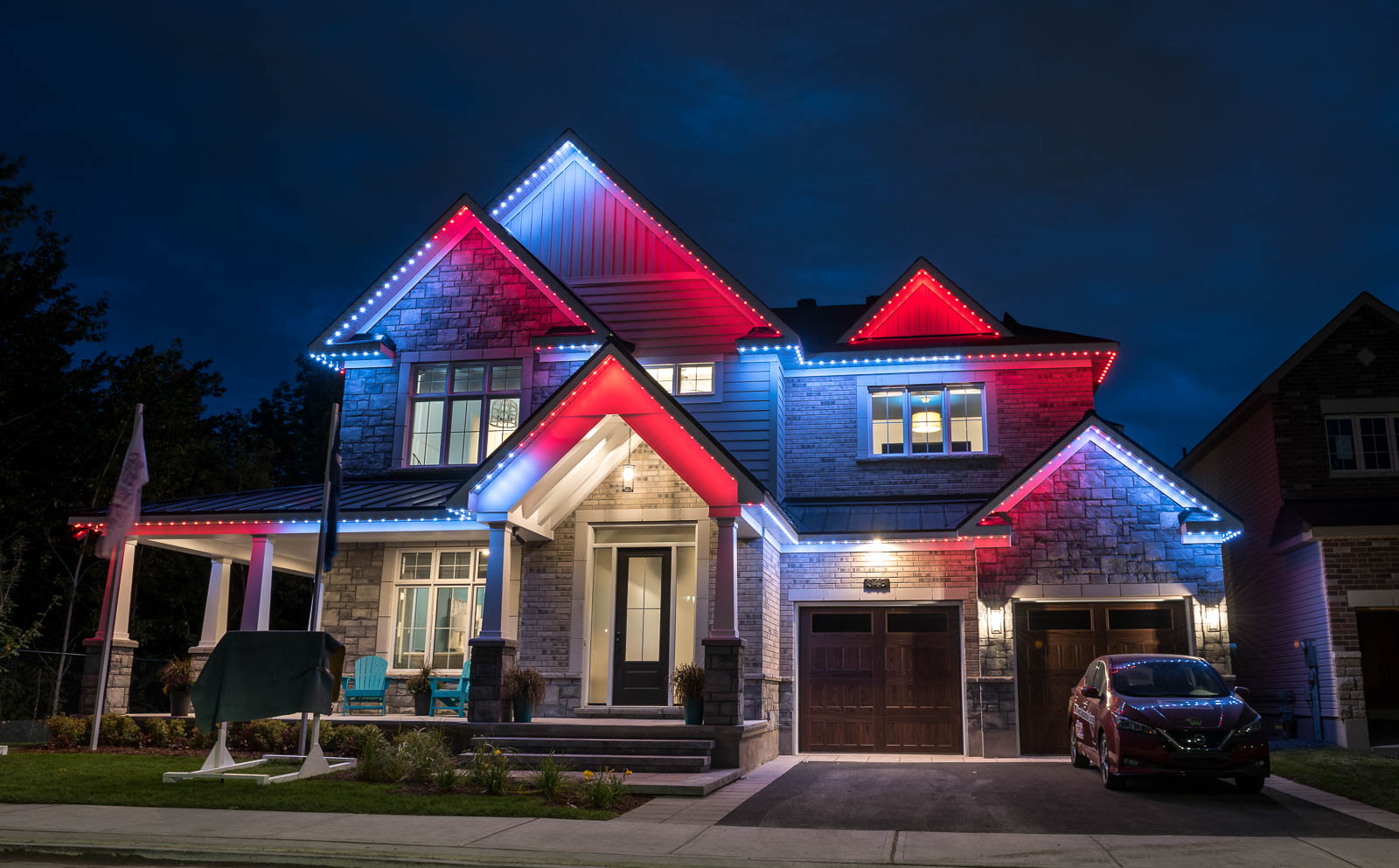 Permanent lighting in mixed holiday colours on a Thunder Bay home